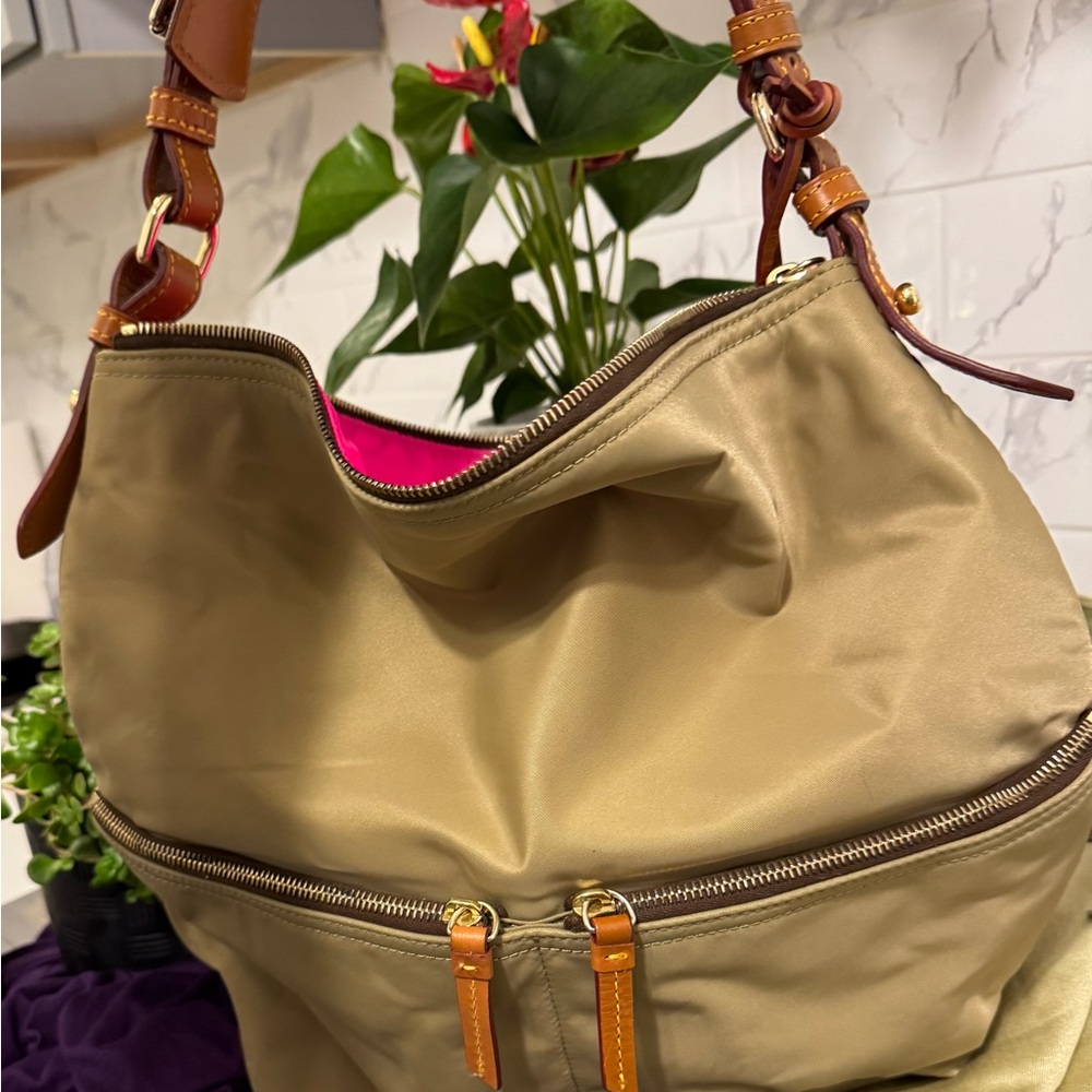 Dooney & Bourke Stylish Tan Nylon Shoulder Bag with two outside zipper pockets